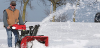 man-snowblowing